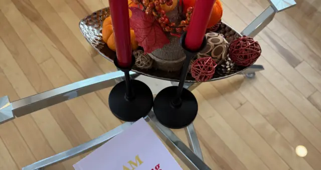 iAmEvolving Journal surrounded by cozy fall decorations, perfect Thanksgiving gift idea.