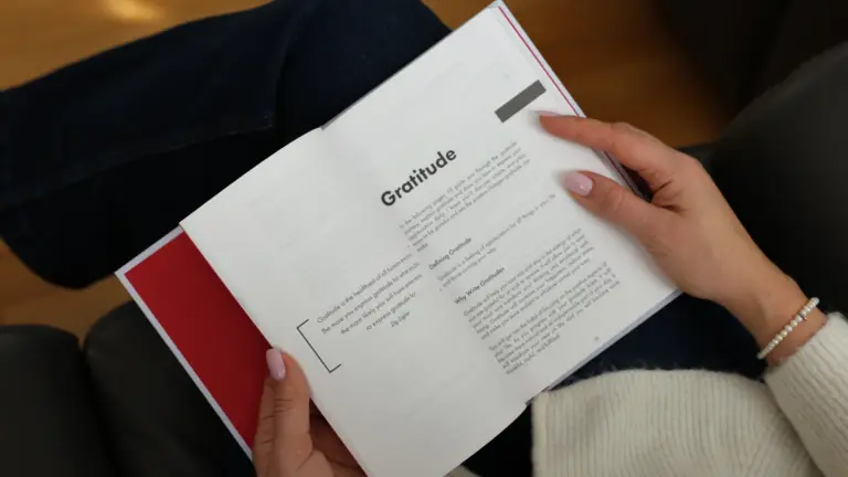 Person reading about gratitude — reflecting on the science and soul of thankfulness.