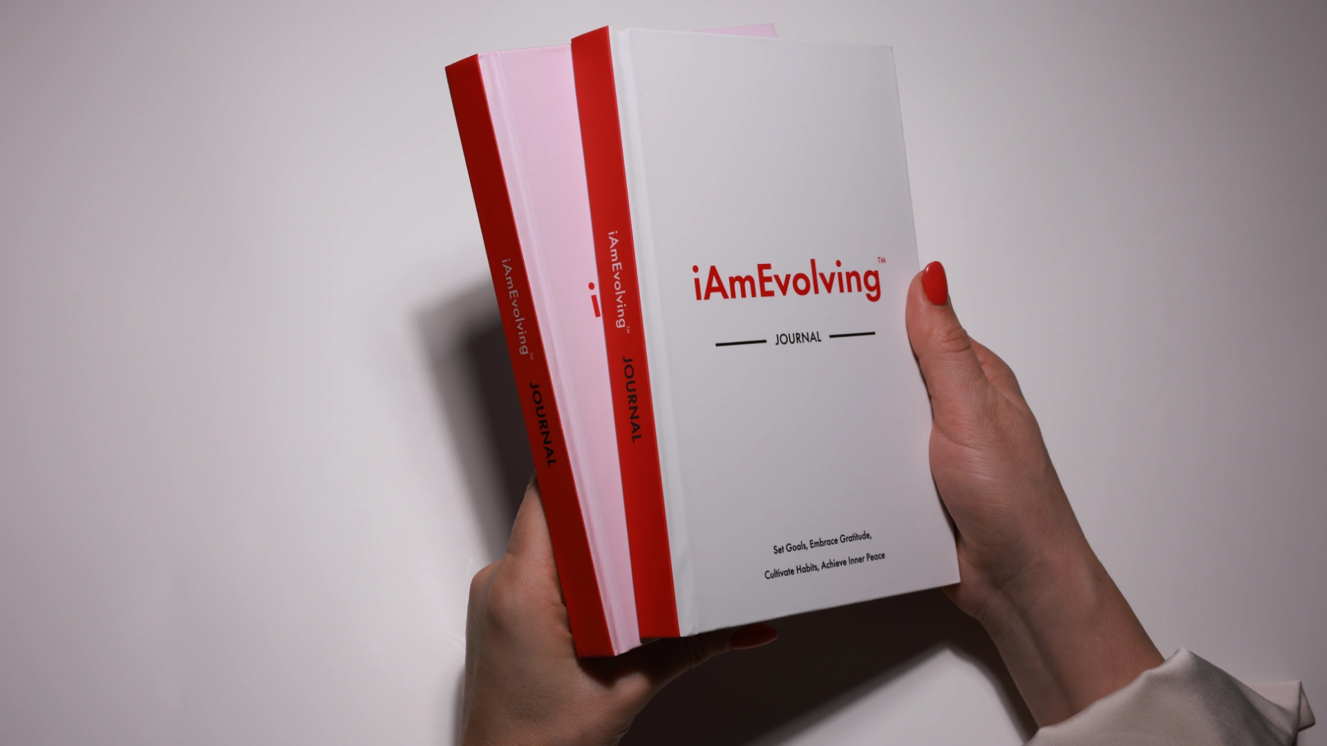 iAmEvolving Journal white and rose covers — best goal setting journals guide