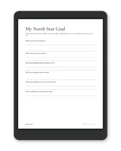 My North Star Goal setup page from the free goal setting journal, with six questions to choose one goal